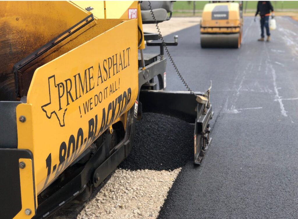 Prime Asphalt paver laying hot-mix asphalt