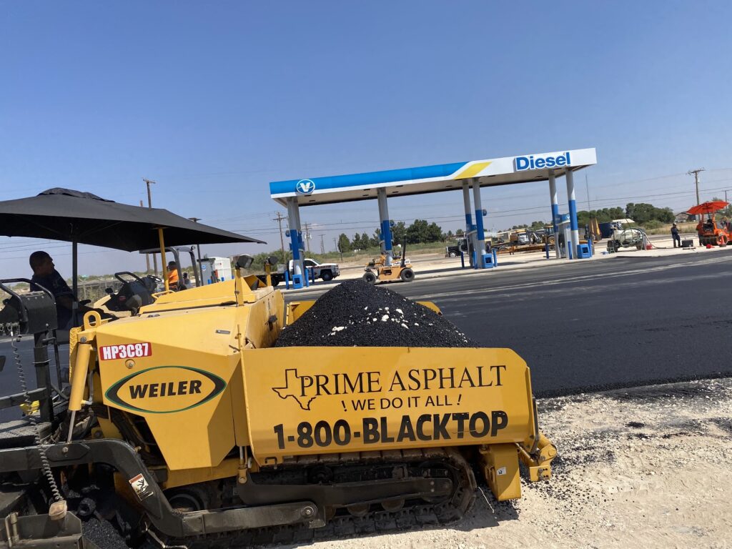 Gas station lot being paved