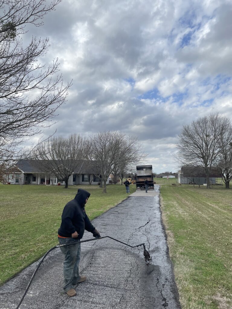 Paving a long driveway up to a house