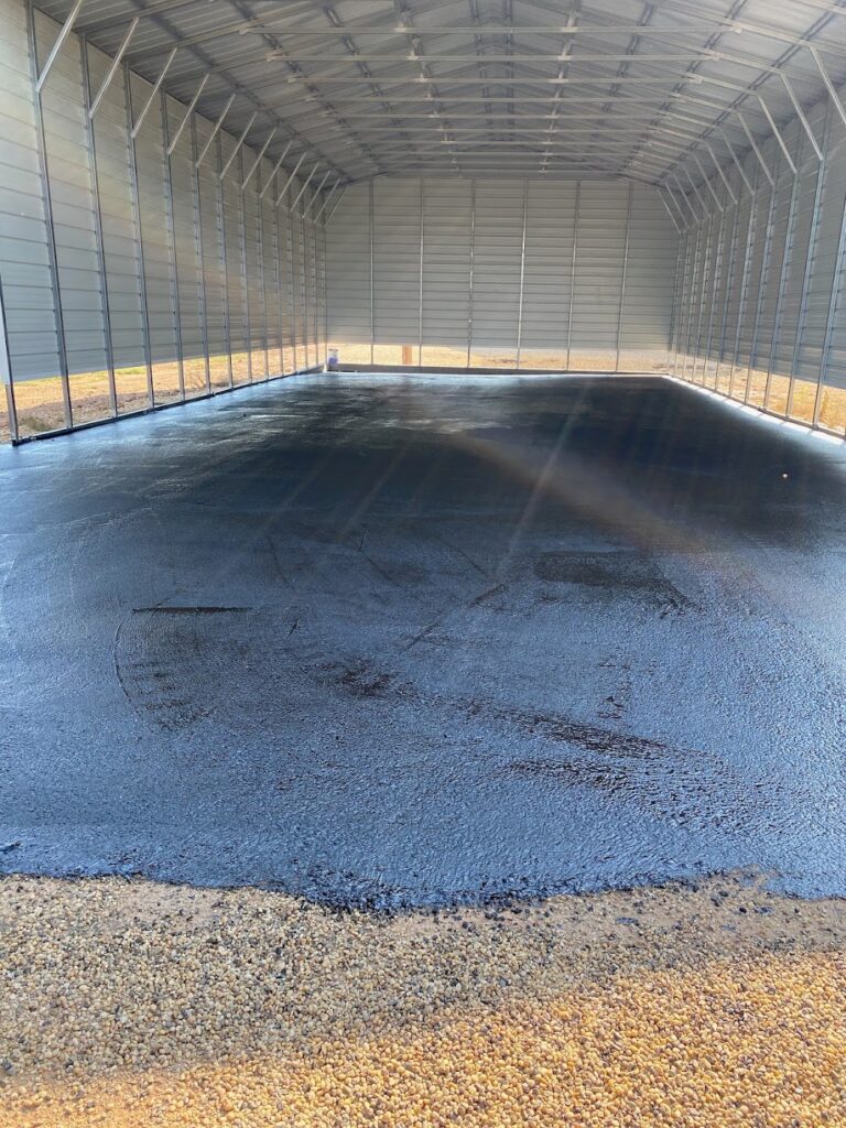 Paved floor in an equipment barn