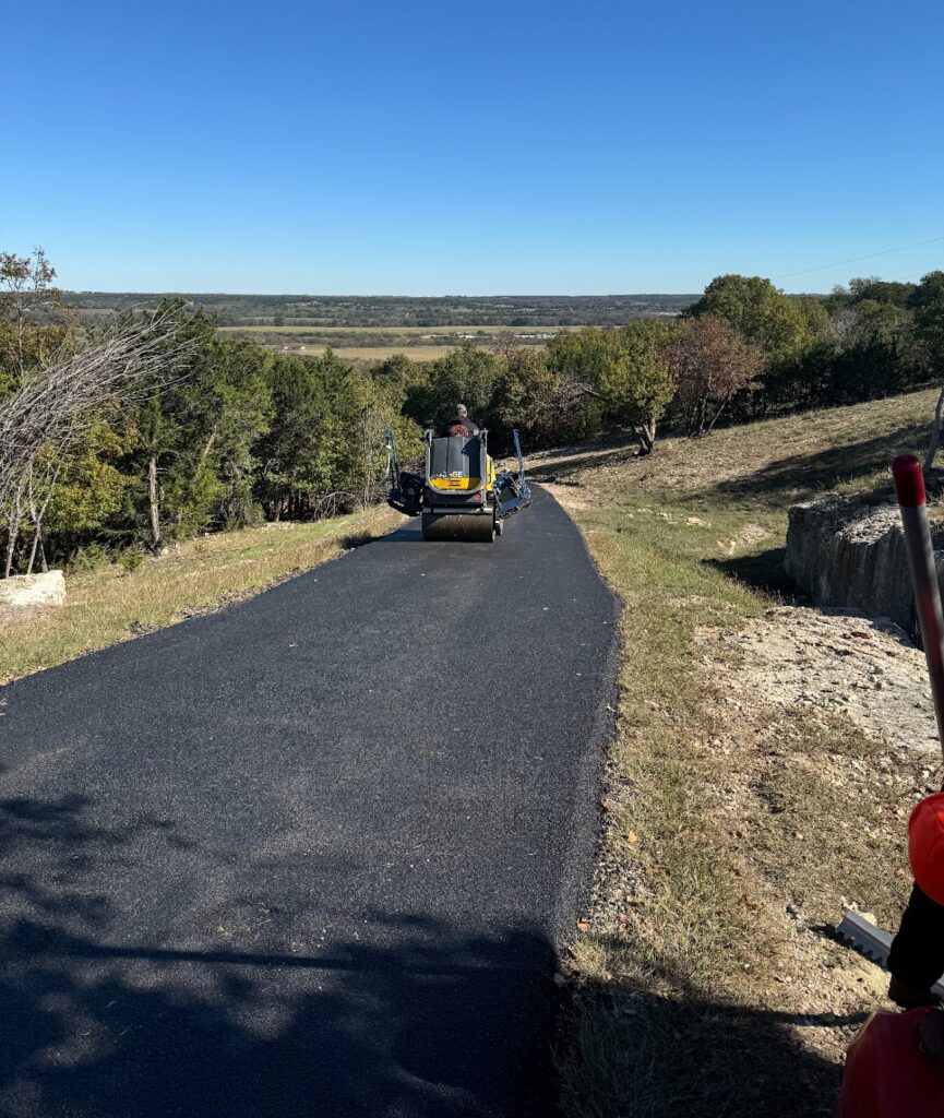 New road winding down a hillside